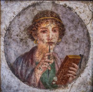 Portrait fresco from Pompeii showing a young woman with a stylus and wax tablet